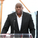 Magic Johnson speaks during a ceremony honoring Judge Greg Mathis with a star on the Hollywood Walk of Fame on May 04, 2022 in Hollywood, California. Johnson’s bid for the Denver Broncos with Philadelphia 76ers owner Josh Harris is up in the air after reports of a sale to another bidder.